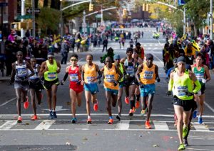Runners in the men's division move through Brooklyn during the New York City Marathon in on Sunday. AP Photo/Craig Ruttle