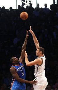 Playing his first game since 2013, Brook Lopez scored 18 points, grabbed six rebounds and blocked a pair of shots in Brooklyn’s rout of Oklahoma City at Downtown’s Barclays Center Monday night. Photos courtesy of the Associated Press