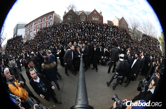Chabad-Lubavitch Rabbis use a device to take a "#KinusSelfie" during their annual meeting of worldwide emissaries. Photo courtesy of Chabad.org