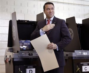 After voting Tuesday in Staten Island, Grimm won re-election to Congress. AP photo