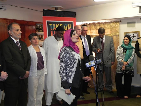Linda Sarsour (at microphone), executive director of the Arab-American Association of New York, is leading a get-out-the-vote drive in southwest Brooklyn. Eagle file photo by Paula Katinas