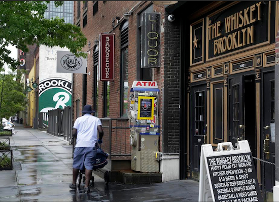 In this July 1, 2013, file photo, restaurants line the street adjacent to the Brooklyn Brewery, in the Williamsburg section of the Brooklyn borough of New York. AP Photo/Richard Drew, File
