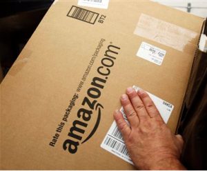 Amazon and Apple are in an ebook fight. AP Photo/Paul Sakuma, File