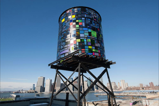 Brooklyn artist Tom Fruin’s solar-powered sculpture, “Watertower 3: R.V. Ingersoll,” is stationed at the roof of 334 Furman St., near Pier 5, in Brooklyn Bridge Park. Photo by Julienne Schaer