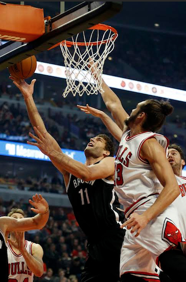 Brook Lopez returned to the starting lineup with a vengeance Tuesday night as the Nets bullied the Bulls in Chicago.