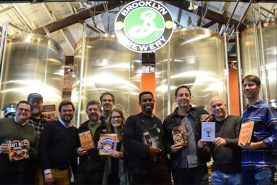 The Brooklyn Brewery hosted a Holiday Book Market on Monday night. Attendees had the opportunity to meet their favorite beer and spirit authors and buy their books, while sharing a beer. Pictured from left: John Holl, Lew Bryson, Giancarlo Annese, Brooklyn Brewery owner Steve Hindy, James Rodewald, Sarah Annese, Brewmaster Garrett Oliver, Jeremy Cowan, Jeff Cioletti and Ben Keene. Eagle photos by Rob Abruzzese