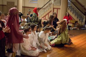 The children rehearse the blocking for the Nativity scene. Eagle Photo by Francesca Norsen Tate