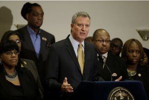 Bill de Blasio and community leaders addressed the media on Wednesday afternoon following the Eric Garner decision. AP photo