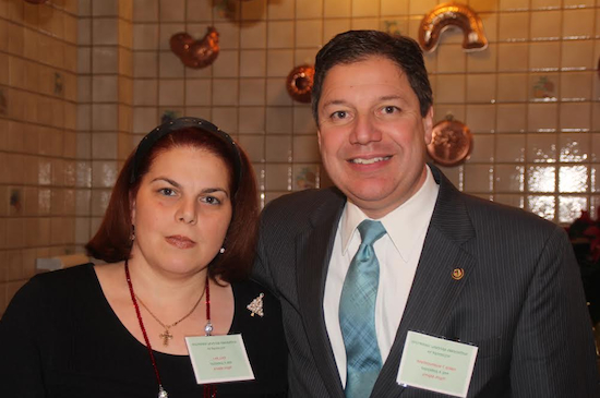 Lucinda DiSalvo, Columbian Lawyers Association President Bart Russo and the Columbian Lawyers Association of Brooklyn hosted its annual holiday party and judicial night at Gargiulo's Restraurant in Coney Island on Thursday night. Eagle photos by Mario Belluomo