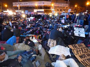 Hundreds of protesters hold "die-in" at Barclays Center in Brooklyn. Photo by Mary Frost