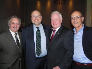 Richard Russo, senior vice president at the Brooklyn Chamber of Commerce;  former mayoral candidate Joe Lhota; state Sen. Marty Golden; and Sam Sutton, a trustee at NYU Langone Medical Center (left to right) enjoy catching up at Golden’s party. Eagle photo Paula Katinas
