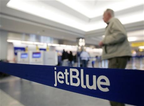 JetBlue airline says it will fly two members from any police department in the country to New York City to attend the funerals of slain NYPD officers Rafael Ramos and Wenjian Liu. AP file photo by Frank Franklin II