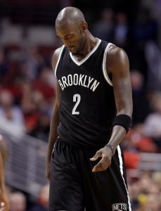 Kevin Garnett dodged a broken left foot but Brooklyn couldn’t avoid getting run over by the Bulls in Chicago on Wednesday night. AP photos