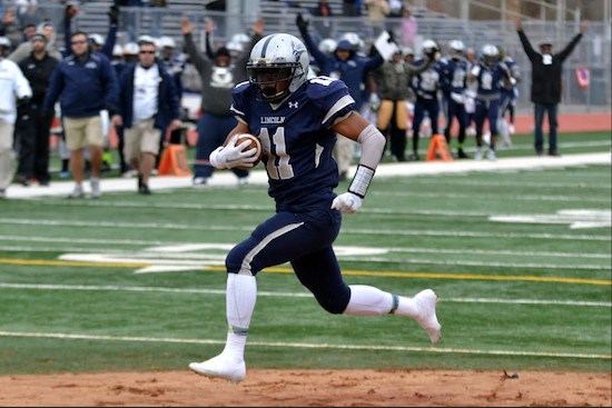 Luis Rodriguez now has 20 touchdowns and over 1,400 total yards this season after he led Lincoln with three touchdowns during a 27­0 victory over Grand Street Campus in the PSAL semifinals in Coney Island on Saturday. The Railsplitters will now face Erasmus Hall in the finals at Yankee Stadium next week. Photos by Rob Abruzzese.