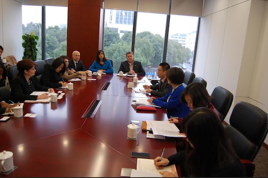Assemblymember Nicole Malliotakis (seated left at head of conference table) and other members of the American delegation meet with municipal leaders in Shanghai. Photo courtesy Malliotakis’ office