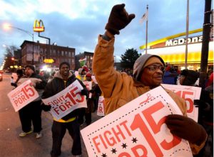 Fast food protestors have asked for a $15 minimum wage at McDonald's. AP photo