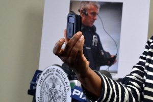 Public Advocate Letitia James shows off one of the potential body cameras for NYPD officers. Eagle photo by Rob Abruzzese