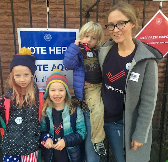 Dara Sicherman, pictured with her family, on Election Day, wearing Gun Sense Voter tees, is a regional manager of Moms Demand Action for Gun Sense in America. Photo courtesy of Dana Sicherman