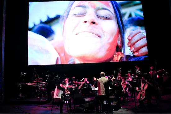 Vijay Iyer and a full orchestra interpret a silent film about the springtime Hindu holiday of Holi. Photos by Rahav Segev, courtesy of BAM
