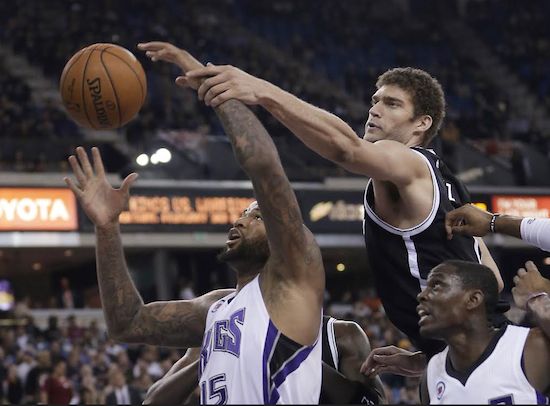 Brook Lopez records one of his six blocked shots Wednesday night as the Nets beat the Kings in Sacramento after announcing that starting point guard Deron Williams would remain sidelined with a rib injury. Photo courtesy of the Associated Press