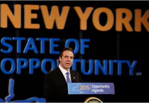 New York Gov. Andrew Cuomo delivers his State of the State address and executive budget proposal at the Empire State Plaza Convention Center on Wednesday in Albany. AP Photo/Mike Groll