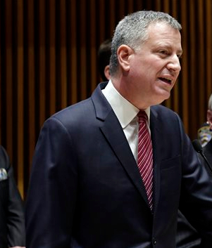 Mayor Bill de Blasio says New Yorkers should not be "caught off guard" by Monday's storm. AP Photo/Richard Drew