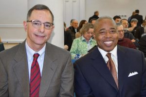 Paul Moses, left, Brooklyn College professor and author of the book “The Saint and the Sultan,” is shown with Brooklyn Borough President Eric Adams. Eagle photos by Rob Abruzzese