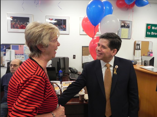 Councilmember Vincent Gentile greets Theresa Scissura, mother of Brooklyn Chamber of Commerce President and CEO Carlo Scissura, at an open house at his Bay Ridge district office. Eagle photo by Paula Katinas