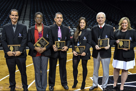 Members of LIU Brooklyn's Hall of Fame Class of 2015 received their plaques at a halftime ceremony (from left): Ricardo Aguilera (men's soccer), Bernadette Shabazz (sister of Lonnie Barton, the golf coach who was honored posthumously), Louis Brignoni (men's basketball), Ashley O'Connor (women's soccer), Ron Solomine (baseball) and Shauna Wilde (women's golf). Eagle photos by Rob Abruzzese