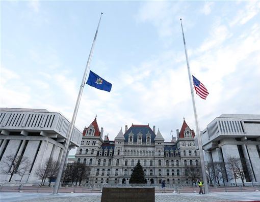 Flags were lowered above the state capitol in Albany to mourn the loss of Mario Cuomo. AP photo