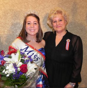 Nordic Delicacies owner Arlene Bakke Rutuelo (right) with Miss Norway contest winner Jillian McDonald in April, says she will remain active in Bay Ridge civic life. Eagle file photo by Paula Katinas