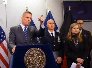 Mayor Bill de Blasio gathered with top city officials at the OEM headquarters in Brooklyn on Monday to update New Yorkers about winter Nor'easter Juno. With de Blasio from left: NYPD Chief of Department James O'Neill, Sanitation Commissioner Kathryn Garcia and Fire Commissioner Daniel Nigro.Photo by Mary Frost