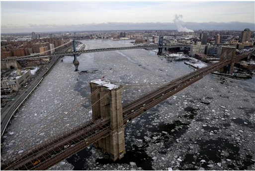 The icy Brooklyn and Manhattan Bridges were once terror targets. AP Photo/Seth Wenig