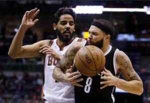 Deron Williams had no points and four turnovers in 22 minutes against Jason Kidd’s Milwaukee Bucks on Monday night. Associated Press photo