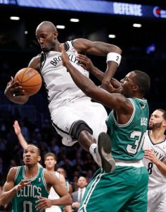 After a season and a half in Downtown Brooklyn, Kevin Garnett is headed back to his original NBA home in Minnesota. AP photos