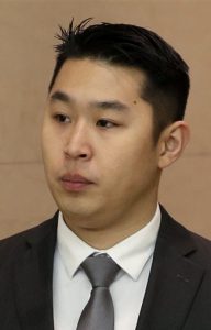 New York City rookie police officer Peter Liang arrives at the courthouse for his arraignment on Wednesday. Liang, who fired into a darkened stairwell last November at a Brooklyn public housing complex, accidentally killing 28-year-old Akai Gurley, was indicted by a grand jury in the shooting. He surrendered Wednesday to face criminal charges. AP Photo/Seth Wenig