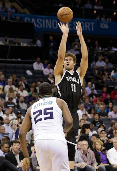 Brook Lopez scored 34 points and made a key defensive stop to preserve Brooklyn’s 91-88 victory in Charlotte on Wednesday night. AP photo