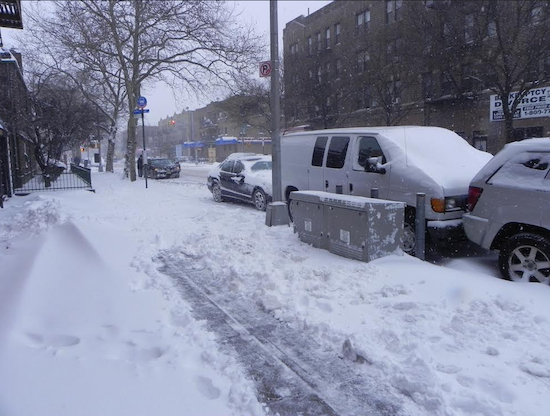 Homeowners are responsible for shoveling snow off sidewalks but the city is supposed to clear the streets. Community Board 11 officials charged that the Dept. of Sanitation’s snow removal efforts were not up to par this winter. Eagle file photo by Paula Katinas