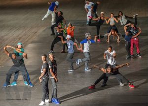 Dancers rehearse for a show called FLEXN, co-directed by Peter Sellars, at the Park Avenue Armory in New York. The emotionally charged performance by 21 African-American dancers explores social and criminal justice issues through dance, photography and public dialogue. AP Photo/Park Avenue Armory, Stephanie Berger