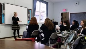 Emily Raleigh, founder and CEO of Smart Girls Group, speaks to students in the classroom. Photo courtesy Fontbonne Hall Academy