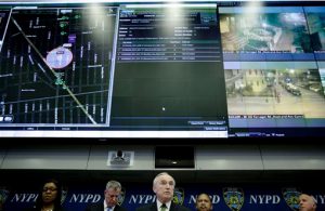 New York City police commissioner Bill Bratton, center, speaks during a news conference at police headquarters in New York on Monday. Bratton and New York City Mayor Bill de Blasio were talking about Shotspotter, a new technology that the NYPD is using to detect gunfire throughout New York City. AP Photos/Seth Wenig