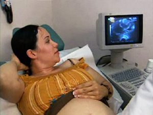 Officials are working on state legislation that would treat pregnancy as a “qualifying event” for insurance under the Affordable Care Act. AP photo/KTLA