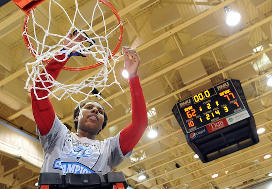 Senior Jaymee Veney cuts down the net after St. Francis won its first Northeast Conference championship in the school’s history. AP Photo/Don Wright