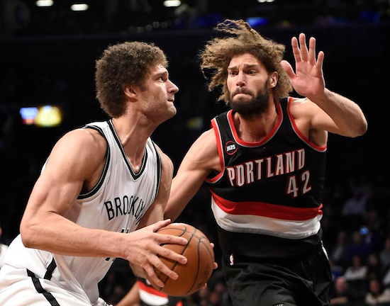 Robin Lopez (right) proved no match for his twin brother Brook, who had 32 points in Brooklyn’s fifth straight home win Monday night at Downtown’s Barclays Center. AP photo