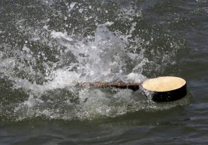 Christopher Swain, not this banjo, will be swimming in the Gowanus Canal on Earth Day. AP photo