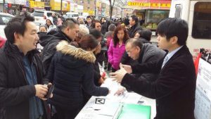Councilmember Menchaca’s budget facilitator Jimmy Li encouraged voters to participate in last year’s Participatory Budget on 8th Avenue in Sunset Park.  Photo courtesy of Councilmember Menchaca’s office