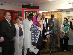 Linda Sarsour (at microphone) is co-chairman of March2Justice, a protest to take place on April 13. Eagle file photo by Paula Katinas