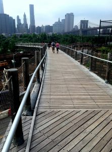Brooklyn Bridge Park officials confirmed this week that they will pursue the recovery of almost $700,000 to repair the popular Squibb Park Bridge, the bouncy pedestrian walkway which connects Squibb Park to the waterfront park. Photo by Will Hasty
