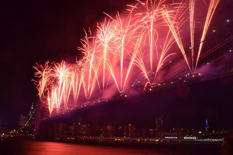 Fireworks launched from the Brooklyn Bridge in the 2014 Fourth of July fireworks display. Photo by Rob Abruzzese