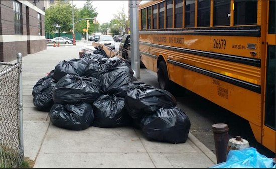 Trash bags pile up outside a Brooklyn yeshiva. Photo courtesy Assemblyman Dov Hikind’s office